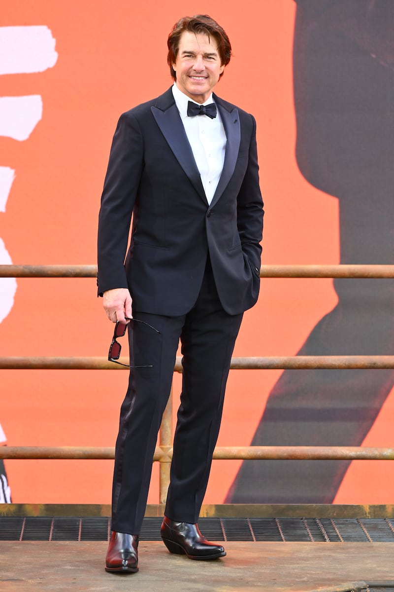 Tom Cruise wears a black custom Giorgio Armani tuxedo for the world premiere of his upcoming movie "Digger" on September 22, 2026, in London.