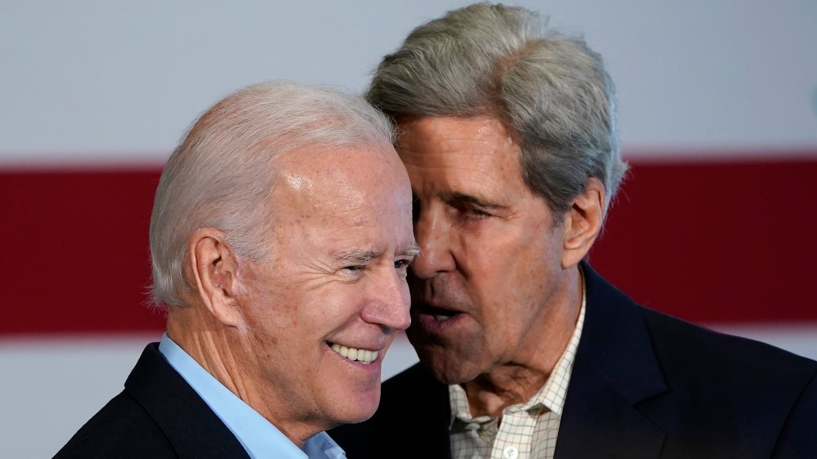 President Joe Biden (L) and former Democratic presidential candidate John Kerry
