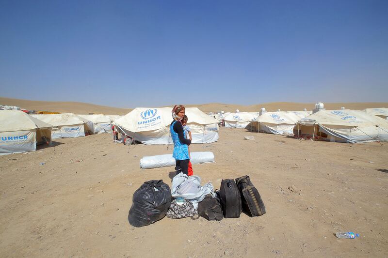 galleries/2013/08/22/syria-s-child-refugee-crisis-hits-one-million-children-displaced-photos/130822-child-refugees-bags_hxoavl