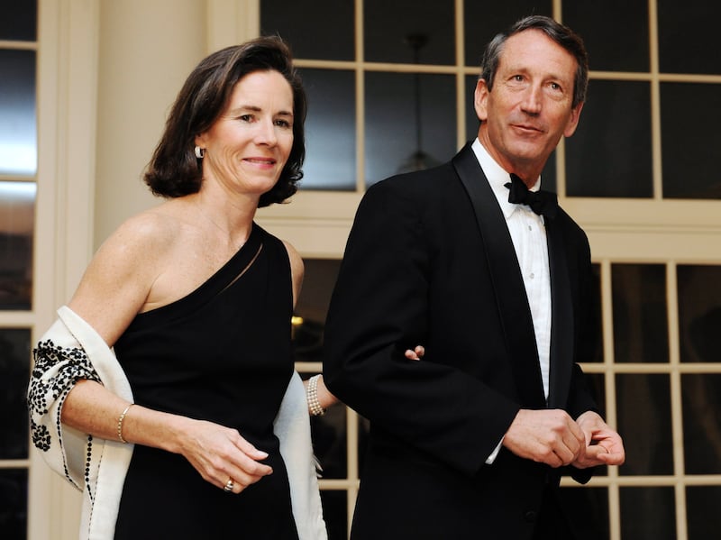 Mark Sanford and his wife Jenny at a White House dinner held by U.S. President Barack Obama for the National Governors Association in Washington, in this file photo taken February 22, 2009.