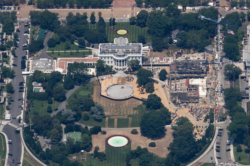 An aerial view of ongoing construction of a helipad and ballroom at the White House from the U.S. Army Golden Knight DHC-8 airplane on the 250th anniversary of U.S. independence, over Washington, D.C., U.S., July 4, 2026. REUTERS/Eric Lee
