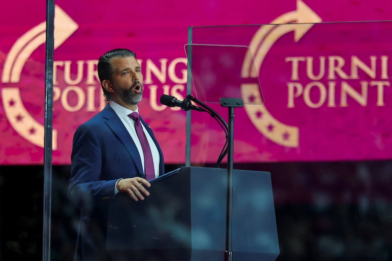 Donald Trump Jr. speaks during a memorial service for slain conservative commentator Charlie Kirk at State Farm Stadium, in Glendale, Arizona, U.S., September 21, 2025.  REUTERS/Daniel Cole