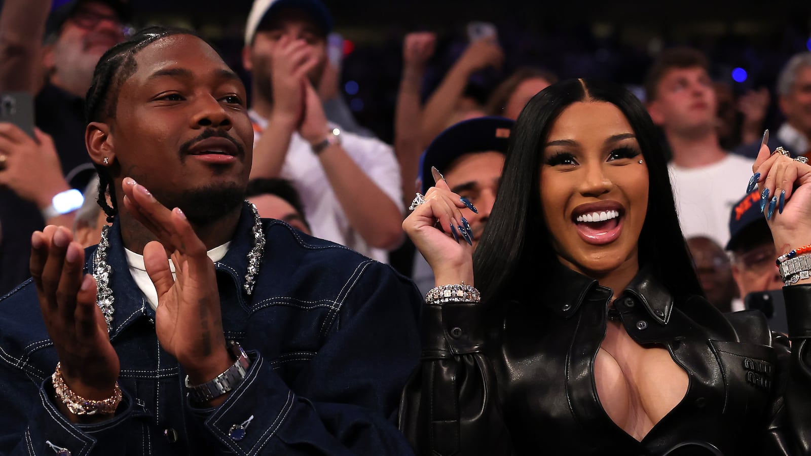 Stefon Diggs and Cardi B watch the Boston Celtics play the New York Knicks.