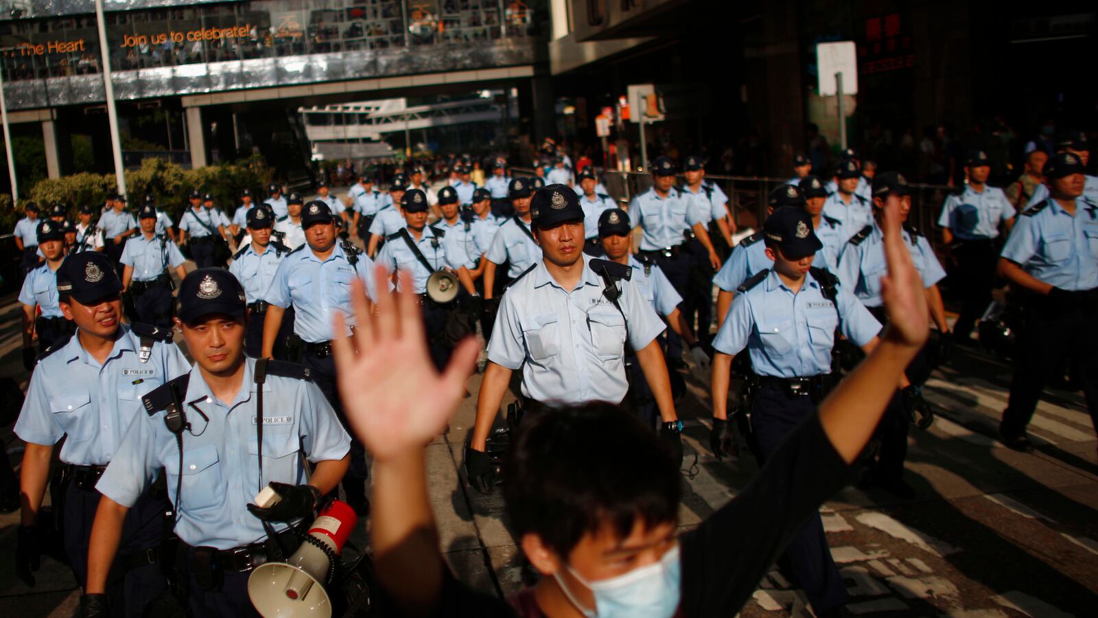 articles/2014/10/02/hong-kong-demonstrators-reject-racism/141001-Leung-hong-kong-tease_bytktu