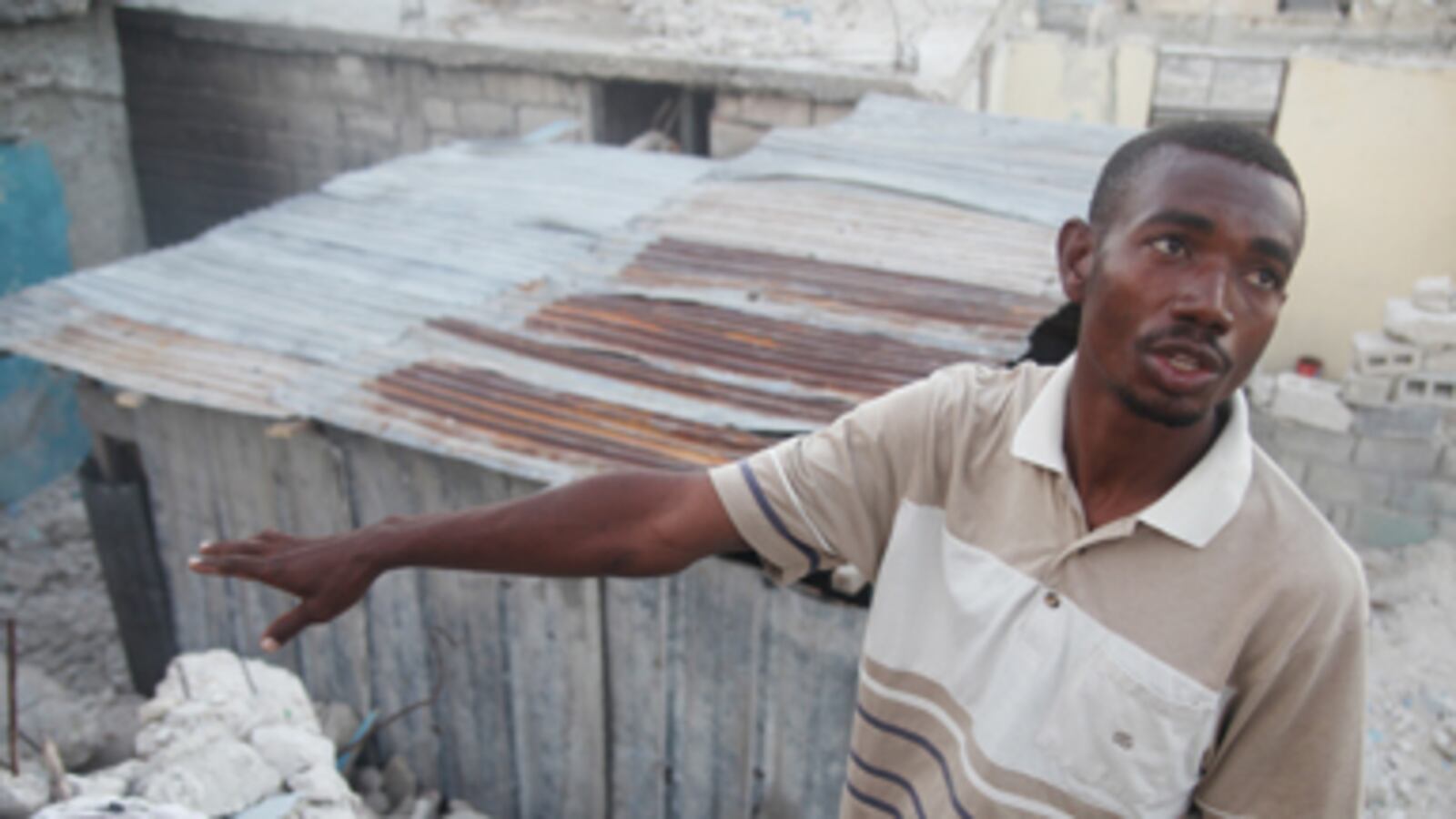 articles/2011/01/14/haiti-earthquake-anniversary-finding-a-skull-in-the-rubble/armstrong-haiti-one-year-later_152760_usdnxc