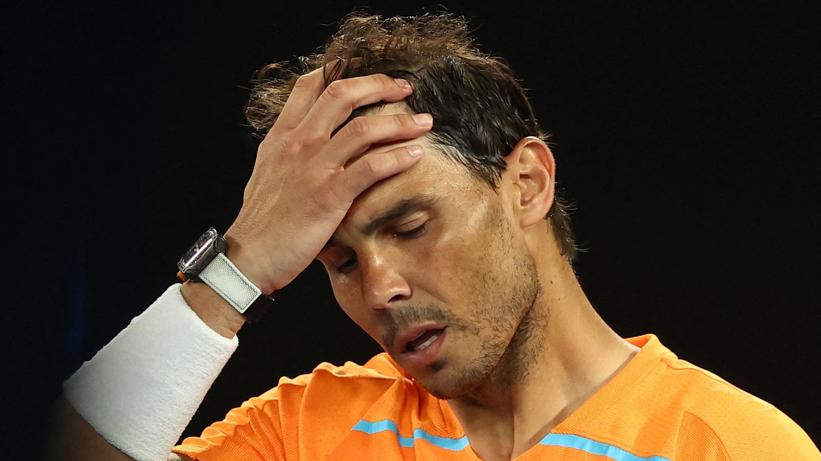 Rafael Nadal looks dejected after losing his second round match against Mackenzie Mcdonald of the Australian Open in Melbourne, Australia, Jan. 18, 2023.