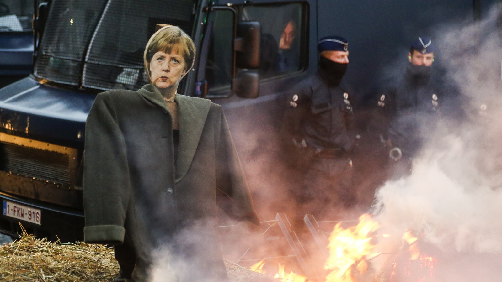 cheats/2014/12/19/farmer-burn-merkel-effigy/141219-angela-merkel-cheat_wxdcnc