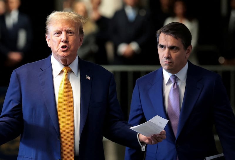 Former U.S. President Donald Trump speaks to members of the media next to his attorney Todd Blanche amid Trump's trial for allegedly covering up hush money payments, at Manhattan Criminal Court on May 7, 2024, in New York City, U.S. Trump has been charged with 34 counts of falsifying business records, which prosecutors say was an effort to hide a potential sex scandal, both before and after the 2016 presidential election. Trump is the first former U.S. president to face trial on criminal charges.