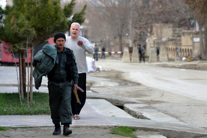 galleries/2014/03/28/taliban-attacks-guest-house-in-kabul-photos/140328-kabul-attack5_nnkcfd