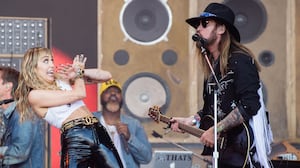Miley Cyrus and Billy Ray Cyrus perform on the Pyramid Stage during day five of Glastonbury Festival in 2019.