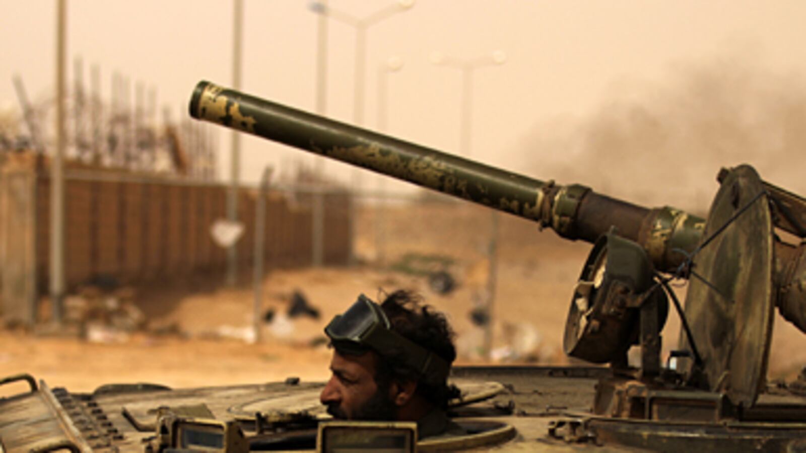articles/2011/03/14/the-libyan-rebels-next-battle-in-ajdabiya-will-be-decisive/dehghanpisheh-ajdabiya_166574_popigp