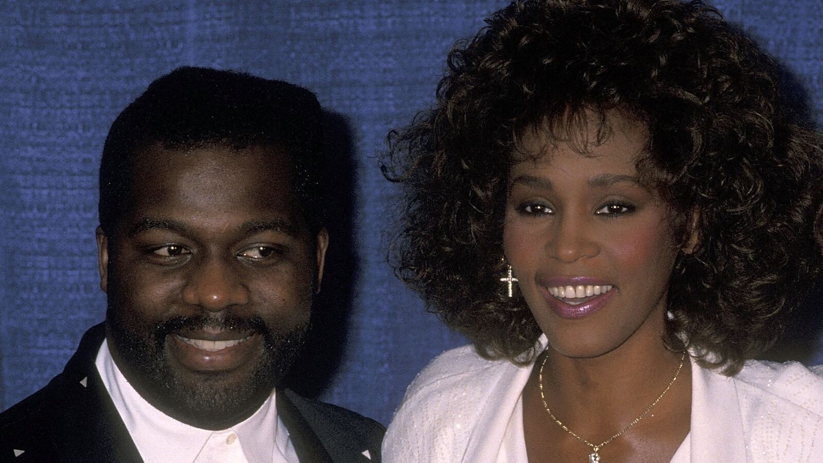 Bebe Winans, Whitney Houston, and Cece Winans at an event in 1990.
