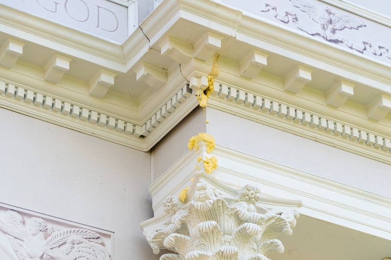 Building material oozes from a smaller replica of U.S. President Donald Trump's proposed 250-foot' Triumphal Arch' at the Great American State Fair on the National Mall in Washington, D.C., U.S., July 1, 2026.