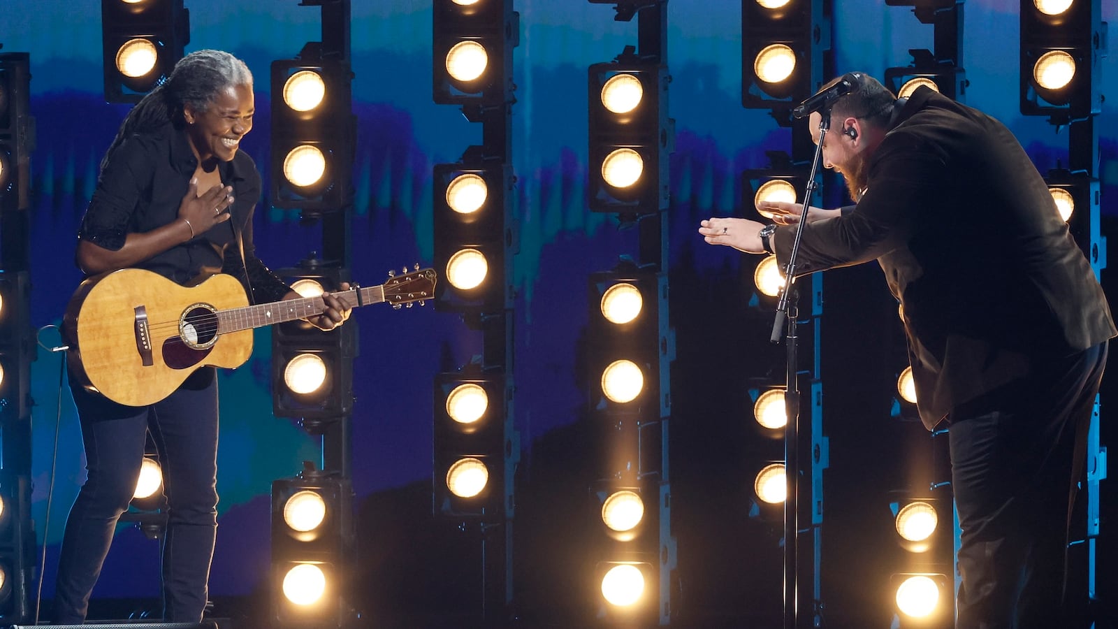 Tracy Chapman, left and Luke Combs, right, at the 66th Grammy Awards