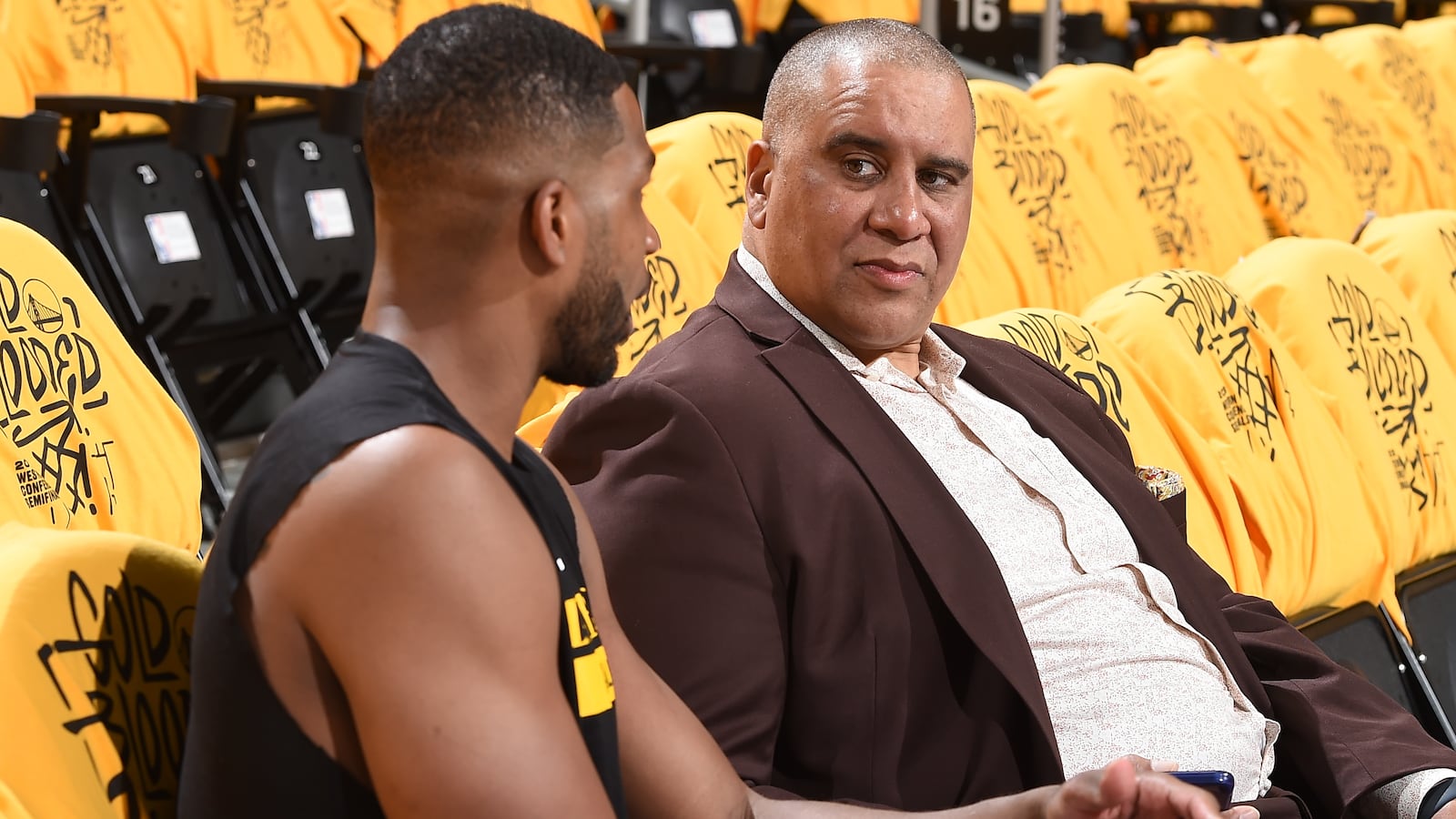 A photo of ESPN reporter Marc Spears interviewing Tristan Thompson of the Los Angeles Lakers in May 2023.