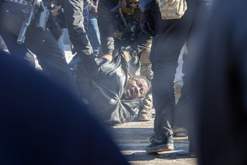 Protesters clash with law enforcement after a federal agent shot and killed a man on Jan. 24, 2026