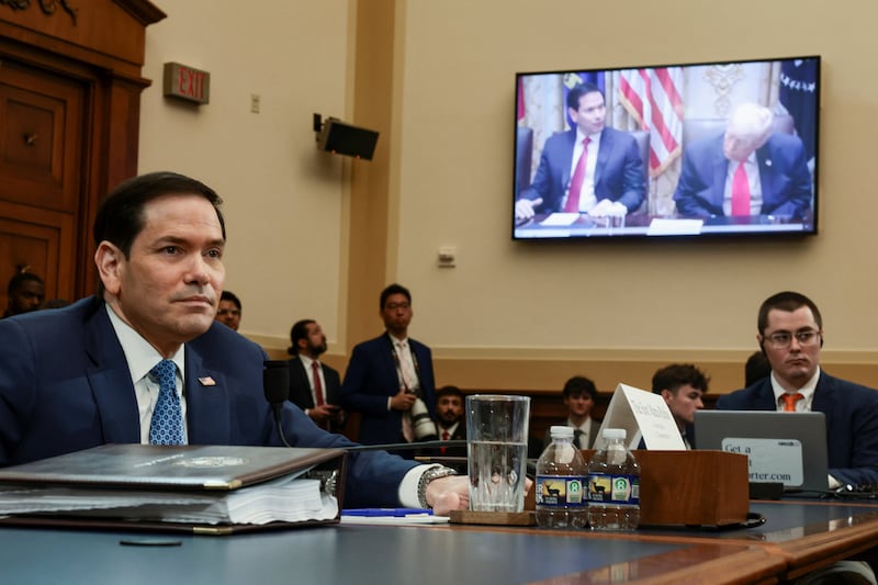 U.S. Secretary of State Marco Rubio watches a video showing him and U.S. President Donald Trump, as he is being questioned at a U.S. House Foreign Affairs Committee hearing on President Donald Trump's Fiscal Year 2027 budget request for the Department of State, on Capitol Hill in Washington, D.C., U.S., June 3, 2026. REUTERS/Evelyn Hockstein