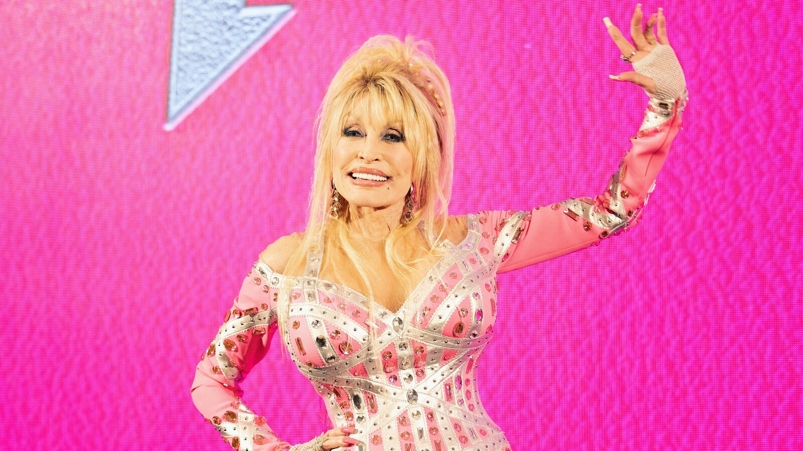 Dolly Parton poses on stage during a press conference to launch her new album