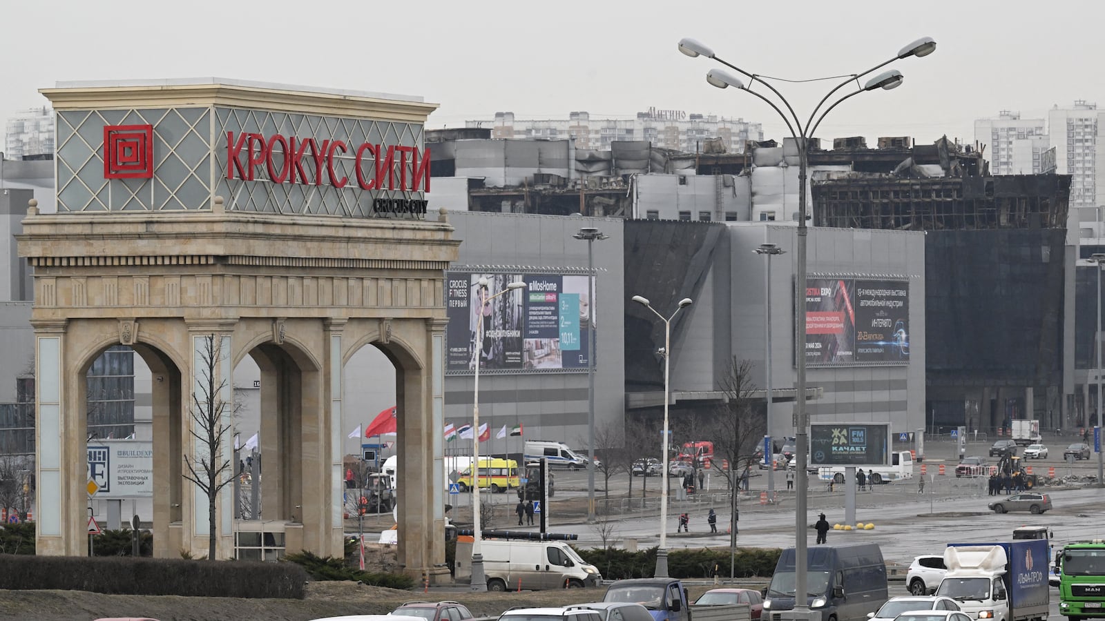 Cars drive past the Crocus City Hall in Moscow’s northern suburb of Krasnogorsk on March 29, 2024, a week after the deadliest attack in Europe to have been claimed by the Islamic State jihadist group that killed at least 143 people.