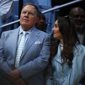 Bill Belichick (L) and Jordon Hudson (R)