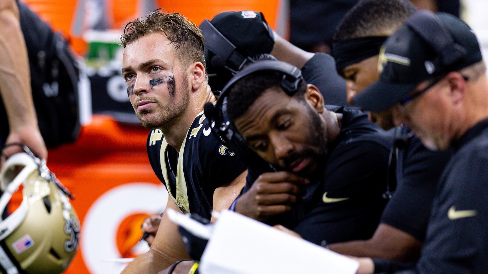 New Orleans Saints quarterback Jake Haener (14) looks on against the Houston Texans