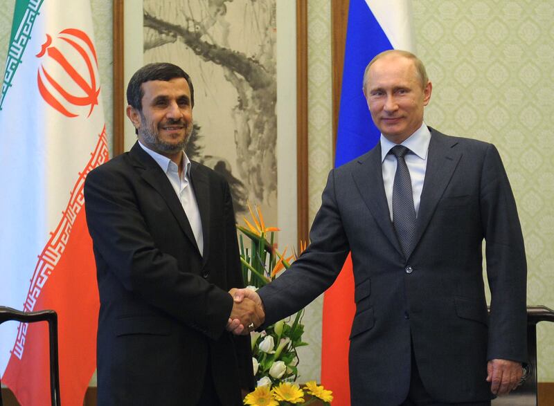 articles/2012/07/02/announcing-the-axis-of-authoritarians/putin_ahmadinejad_izpysi