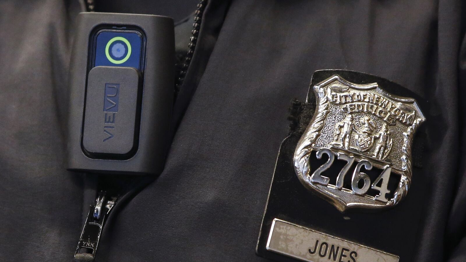articles/2015/04/20/cops-forced-to-buy-their-own-body-cams/150420-briquelet-cop-cams-tease_laowez