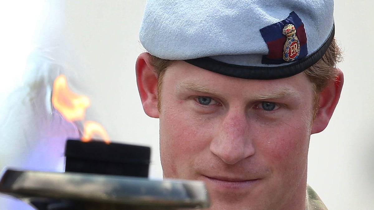 articles/2013/06/03/bizarre-threat-to-kill-prince-harry/harry-torch_x4b6ll