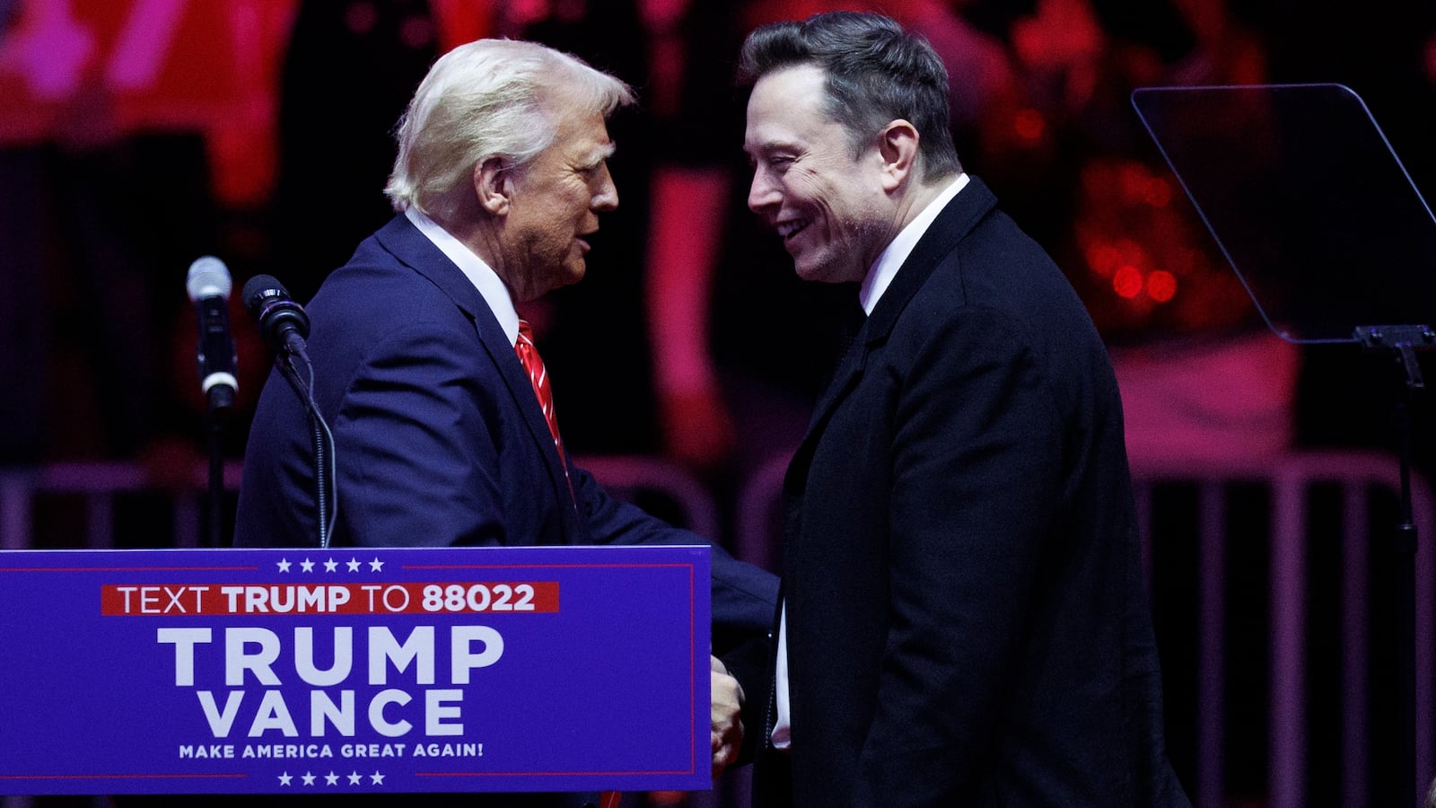 Elon Musk walks on stage with his son, X, beside President-elect Donald Trump during a rally at Capital One Arena in Washington, on January 19, 2025.