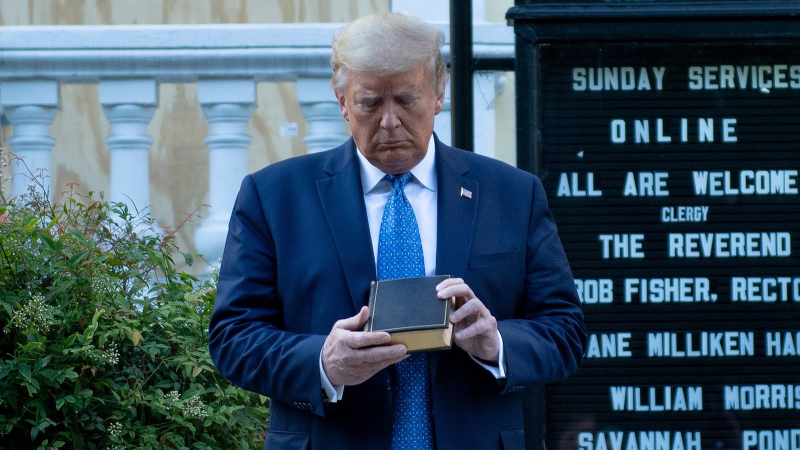 US President Donald Trump holds a Bible while visiting St. John's Church across from the White House after the area was cleared of people protesting the death of George Floyd June 1, 2020, in Washington, DC. - US President Donald Trump was due to make a televised address to the nation on Monday after days of anti-racism protests against police brutality that have erupted into violence.
The White House announced that the president would make remarks imminently after he has been criticized for not publicly addressing in the crisis in recent days. (Photo by Brendan Smialowski / AFP) (Photo by BRENDAN SMIALOWSKI/AFP via Getty Images)