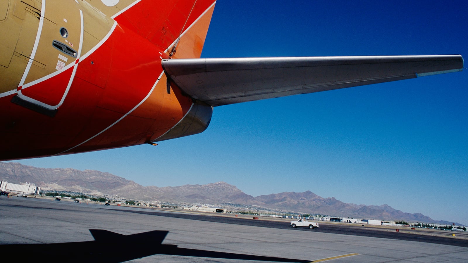 A Southwest Airlines plane is parked at its flight line at the El Paso International Airport. (Photo by mark peterson/Corbis via Getty Images)