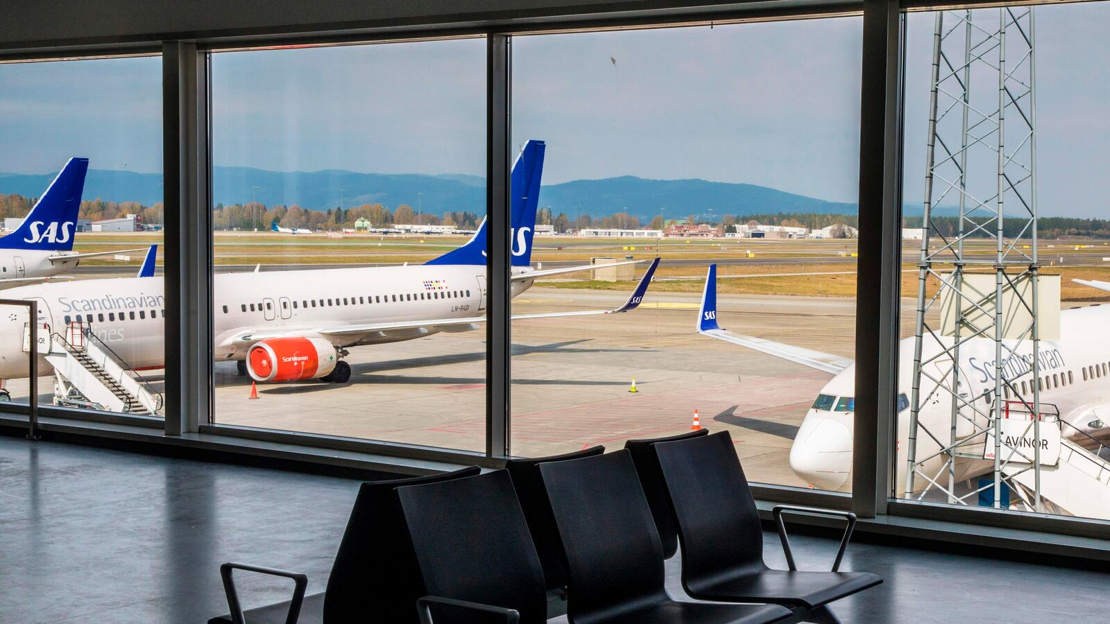 Airplanes of the Scandinavian Airlines' SAS company park on ground at the Gardamoen Airport during a strike of pilots to contest wages and working hours on April 26, 2019 in Oslo, Norway. - Pilots at SAS walked off the job in Sweden, Denmark and Norway, stranding 70,000 travellers as more than 300 flights were cancelled, the airline said. Domestic, European and long-haul flights were all affected by the strike, it said, predicting that a total of 170,000 passengers would be affected through April 28, 2019.