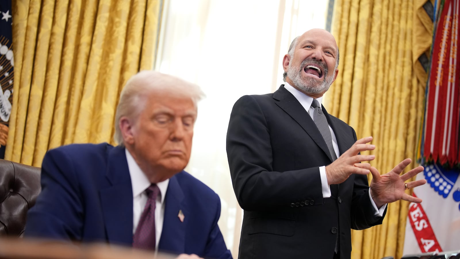 Secretary of Commerce Howard Lutnick speaks alongside President Donald Trump after Trump signed an executive order on "reciprocal" tariffs in the Oval Office at the White House on Feb. 13.