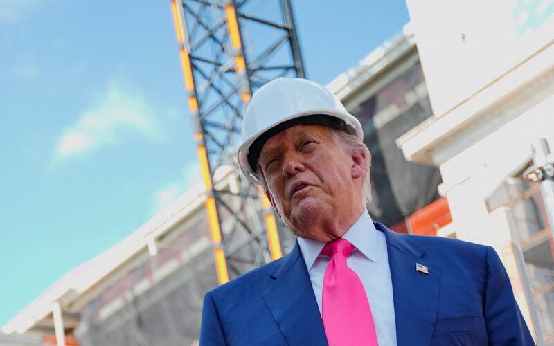 U.S. President Donald Trump speaks to the media during a tour of the Federal Reserve Board building, which is currently undergoing renovations, in Washington, D.C., U.S., July 24, 2025. REUTERS/Kent Nishimura
