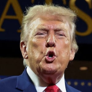 U.S. President Donald Trump arrives to deliver remarks on the "Trump Accounts" tax-advantaged investment program at Wheeler High School in Marietta, Georgia, U.S., July 22, 2026. REUTERS/Evelyn Hockstein