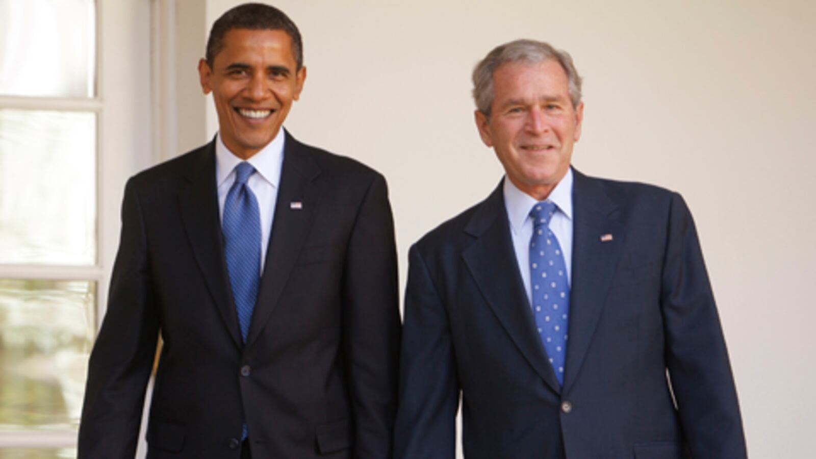 articles/2008/11/29/america-suddenly-has-two-presidents/zelizer-bush-obama_6141_m2e1lt
