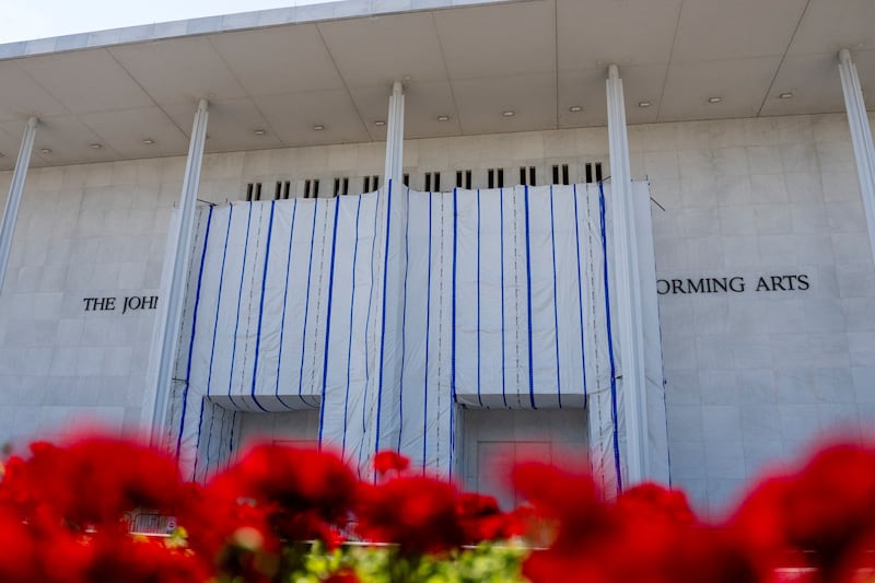 A tarp covers the name of the John F. Kennedy Center for the Performing Arts in Washington, D.C., U.S., August 29, 2026.