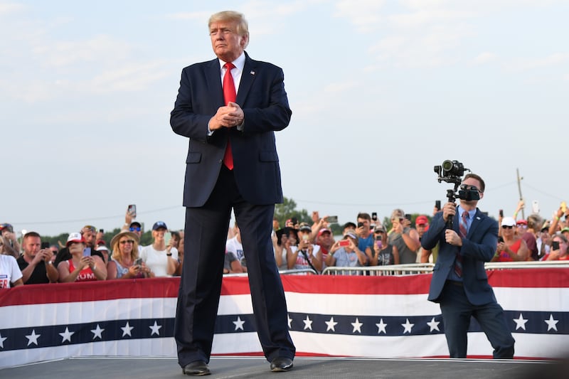 MENDON, IL - JUNE 25: Donald Trump arrives to give remarks during a Save America Rally with former US President Donald Trump at the Adams County Fairgrounds on June 25, 2022 in Mendon, Illinois. Trump will be stumping for Rep. Mary Miller in an Illinois congressional primary and it will be Trump's first rally since the United States Supreme Court struck down Roe v. Wade on Friday. (Photo by Michael B. Thomas/Getty Images)