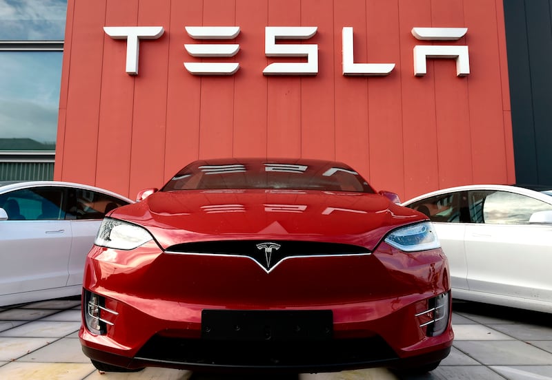 The logo marks the showroom and service center for the US automotive and energy company Tesla in Amsterdam
