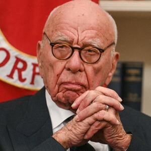 Rupert Murdoch looks as US President Donald Trump speaks to the press after signing an executive order to create a US sovereign wealth fund, in the Oval Office of the White House on February 3, 2025, in Washington, DC. (Photo by Jim WATSON / AFP) (Photo by JIM WATSON/AFP via Getty Images)