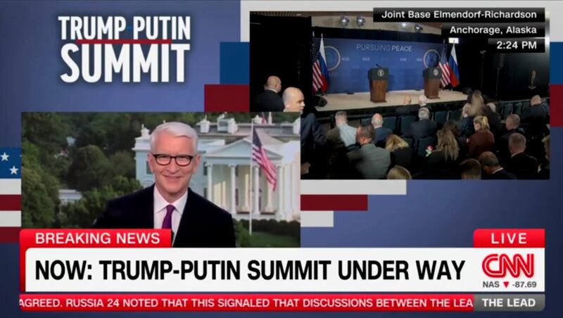 Anderson Cooper reacts to Jake Tapper's hot mic moment on CNN.