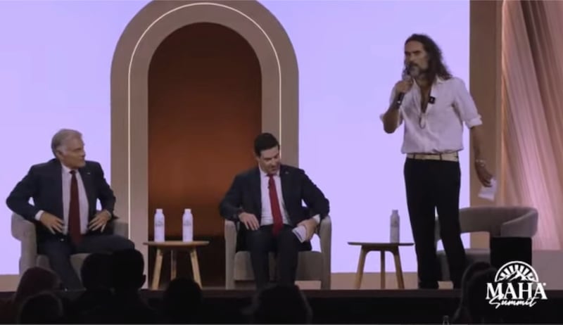 Russell Brand moderated a panel with Dr. Mehmet Oz on Tuesday at the MAHA summit.