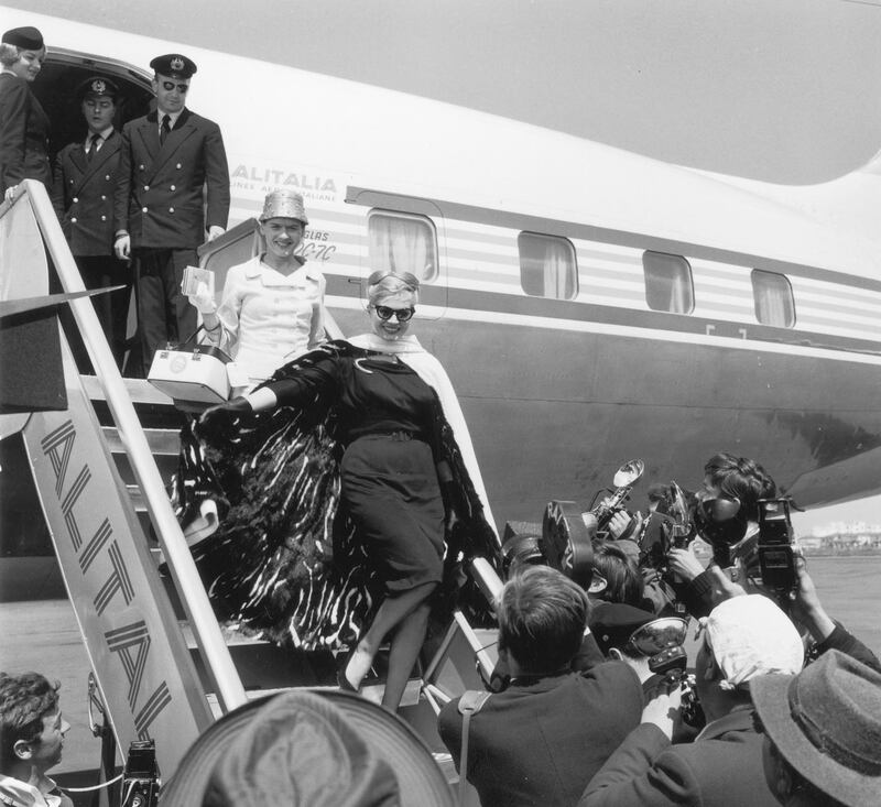 galleries/2013/08/10/classic-jet-set-jackie-o-liz-tayor-more-stars-in-the-air-photos/classic-jet-set-anita-ekberg_euqhm9