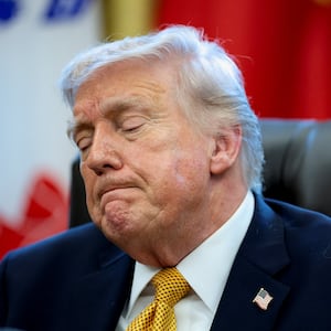 U.S. President Donald Trump reacts as he takes questions from reporters during an event to sign an executive order creating an anti‑fraud task force headed by U.S. Vice President JD Vance in the Oval Office at the White House in Washington, D.C., U.S., March 16, 2026. REUTERS/Jonathan Ernst