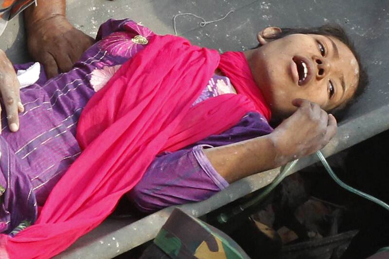 galleries/2013/05/10/woman-rescued-from-rubble-17-days-after-bangladesh-factory-collapse-photos/garment-rescue-8_ua8btp