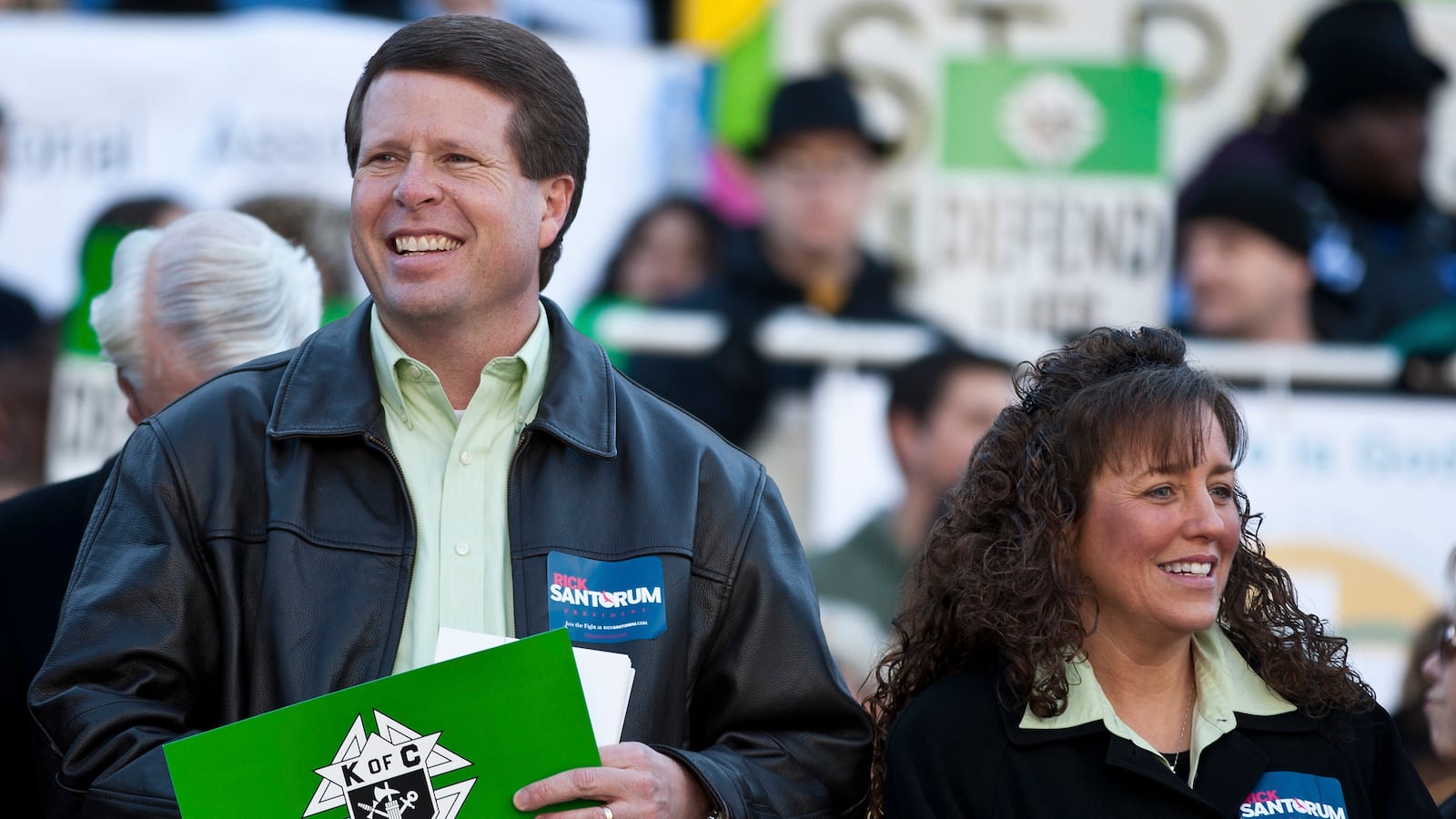 Jim Bob Duggar (L) and his wife Michelle Duggar (R), supporters of Republican presidential candidate and former Pennsylvania Senator Rick Santorum, attend a Pro-Life rally in Columbia, South Carolina, on the steps of the State House January 14, 2012.