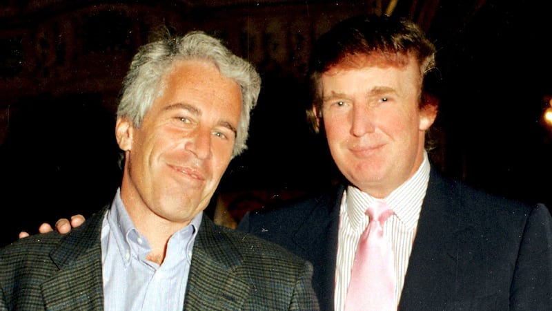 Jeffrey Epstein (left) and Donald Trump as they pose together at the Mar-a-Lago estate, Palm Beach, Florida on February 22, 1997.