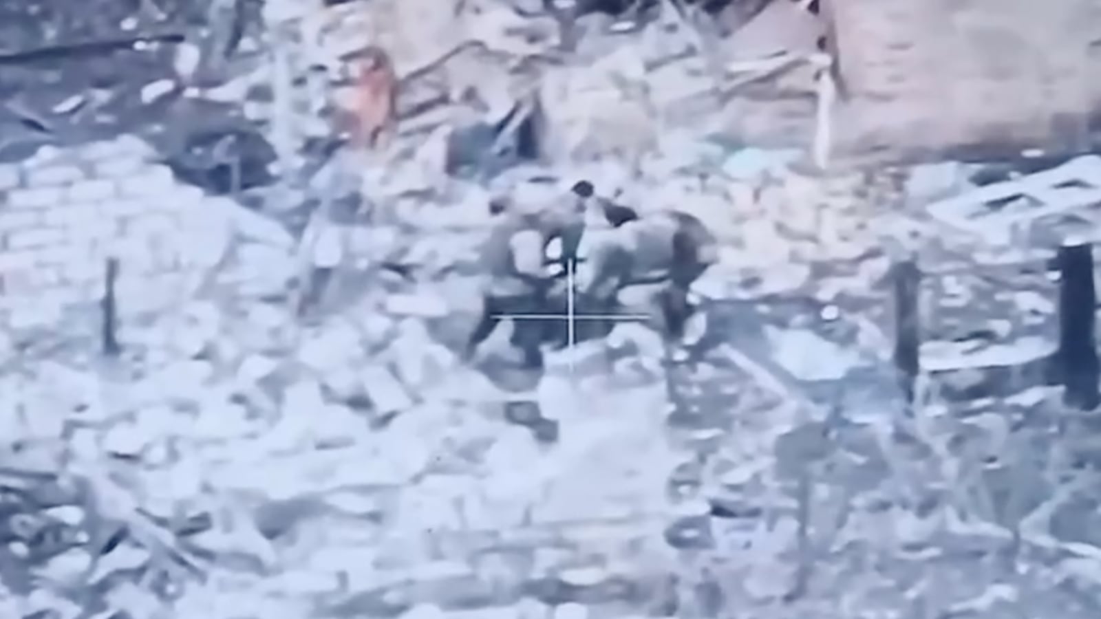 Wagner mercenaries seen in drone footage allegedly beating their own commander.