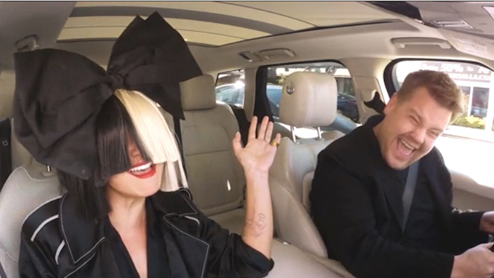 articles/2016/02/17/sia-and-james-corden-belt-out-the-hits-in-carpool-karaoke/160217-wilstein-sia-corden-tease_gvtzz6