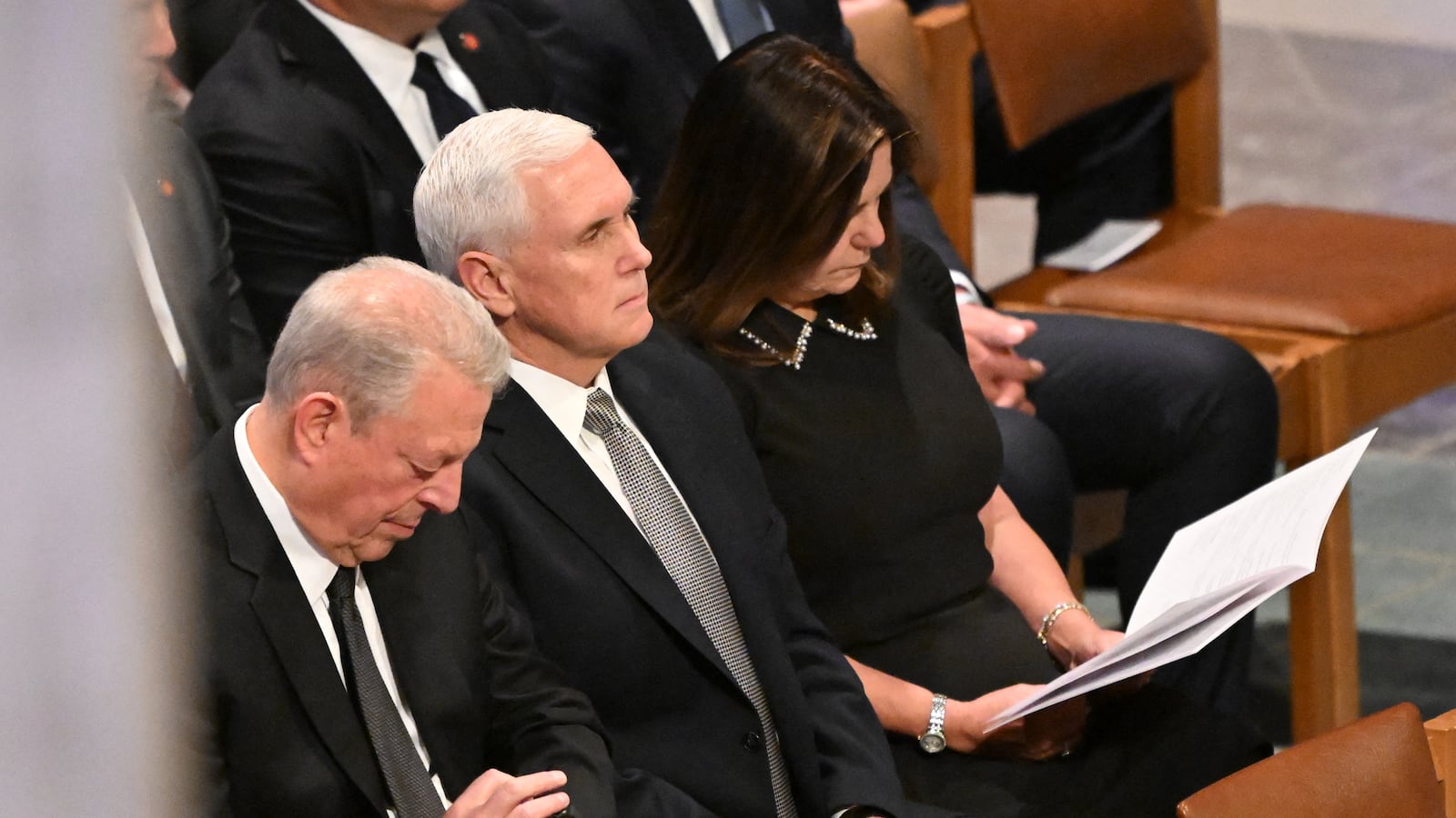 (L-R) Former US Vice President Al Gore, former US Vice President Mike Pence and his wife Karen Pence attend the State Funeral Service for former US President Jimmy Carter at the Washington National Cathedral in Washington, DC, on January 9, 2025.